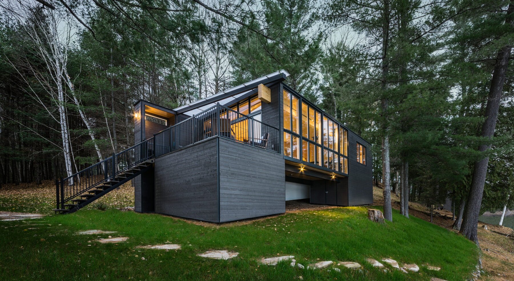 Angled-view of exterior of CLT Cottage from lake