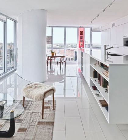 Redeveloper Apartment living area and kitchen with view of balcony