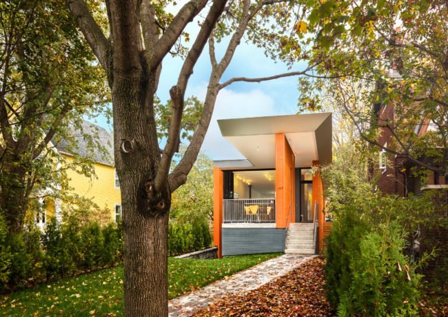 Stacey-Turley front facade in daytime surrounded by trees