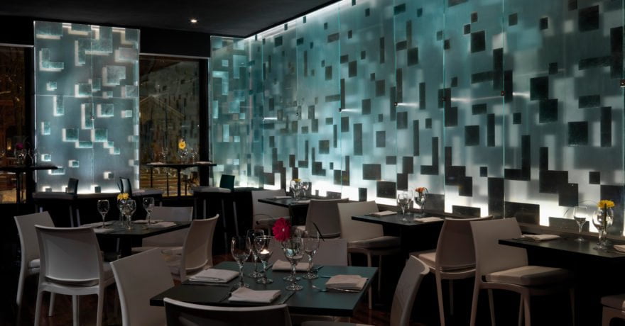 Wide-shot of B-Side Wine Bar interior dining area and wall details